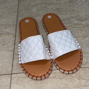 Beautiful cream and white sandals.Size 9 in women